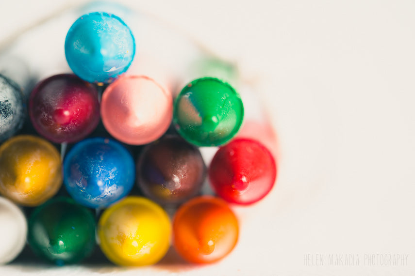 Photograph of vibrant, colorful crayon tips as wall art
