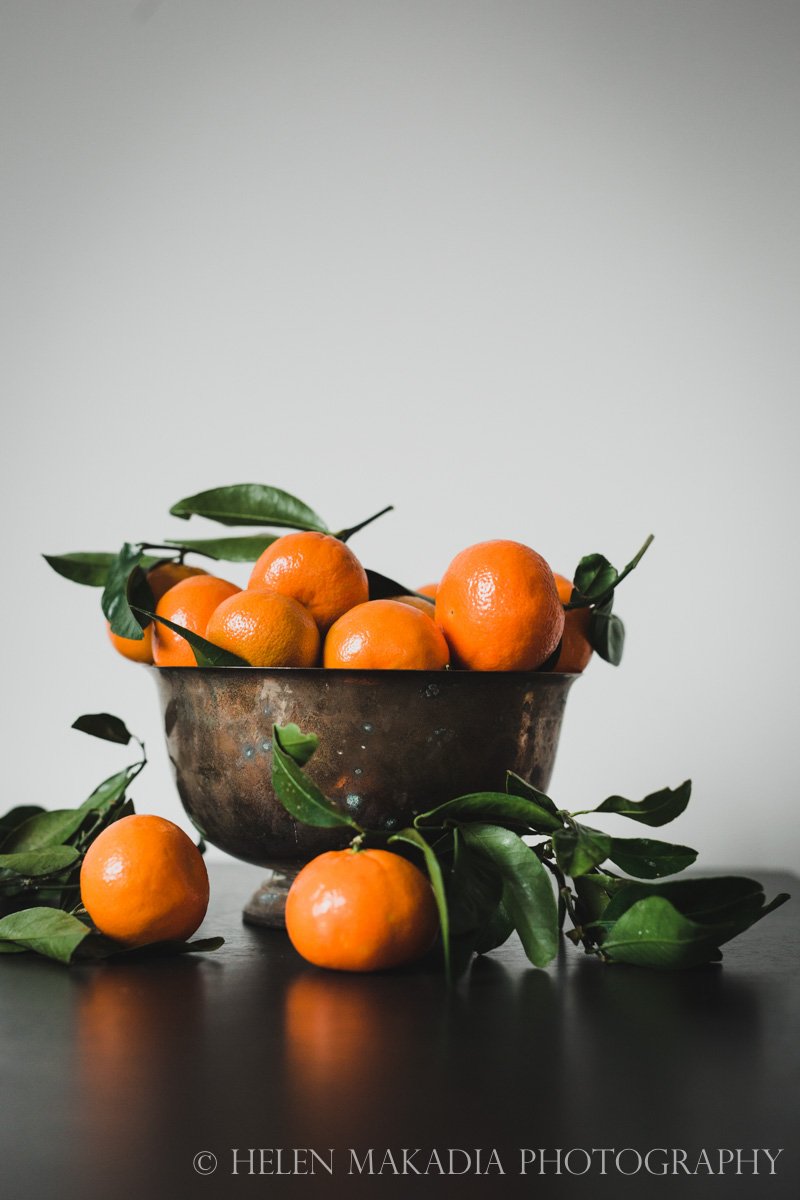 A bowl of mandarins art print