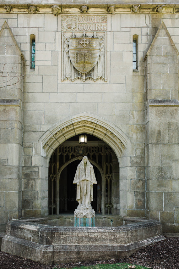 Photograph of Tower Court complex stone facade and statue at Wellesley College