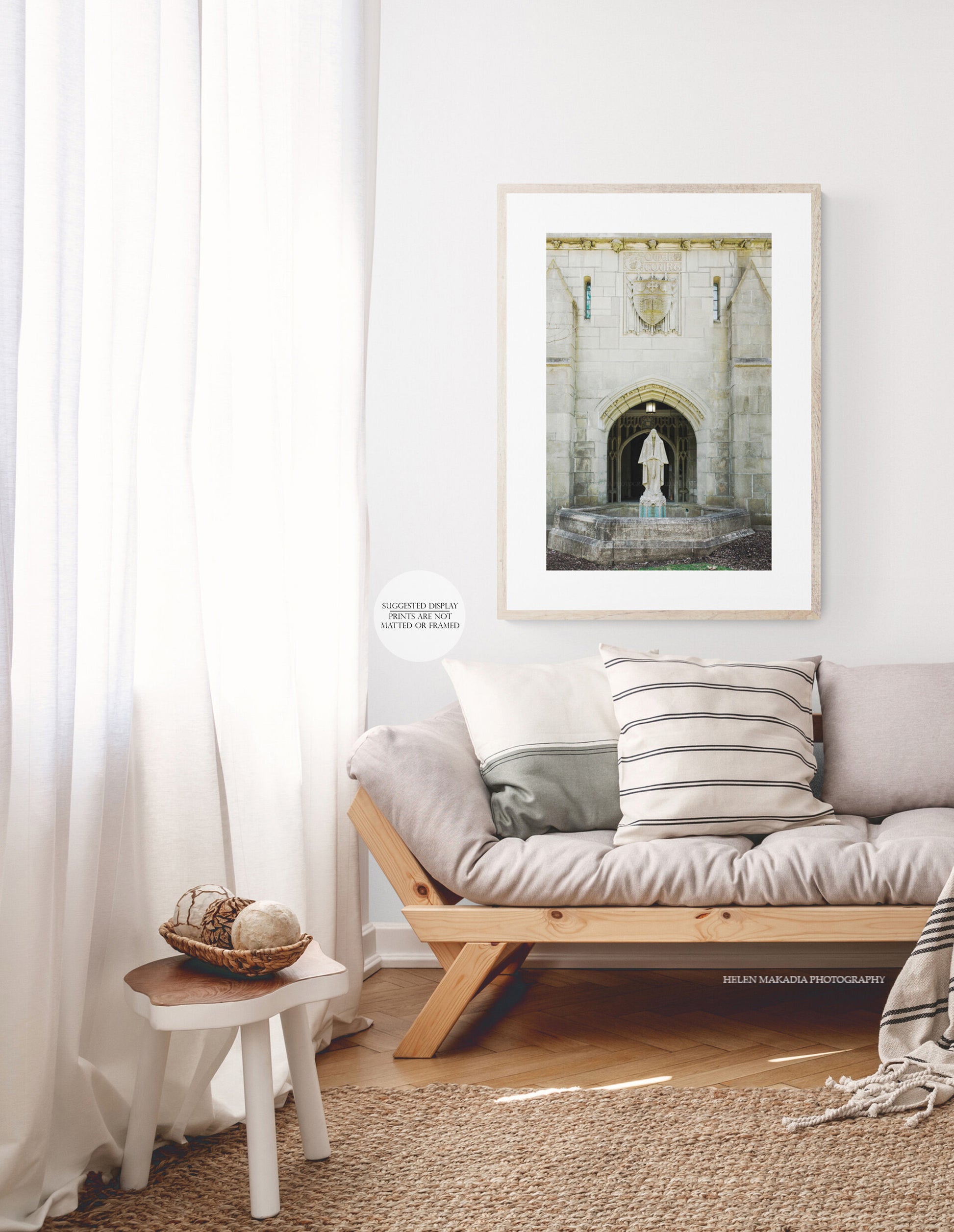 Photograph of Tower Court complex stone facade and statue at Wellesley College in a living room