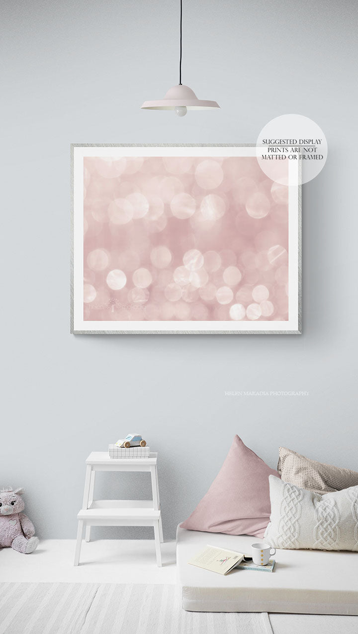 A print of abstract pink bubbles in a kid's room