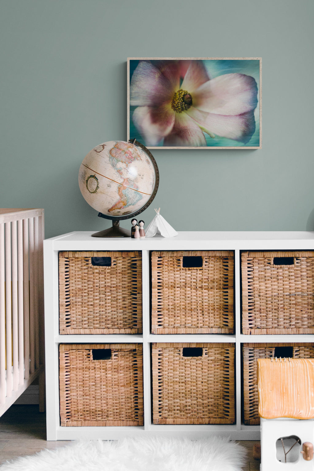 A painterly photograph of a ranunculus as wall art inspiration in a childs room