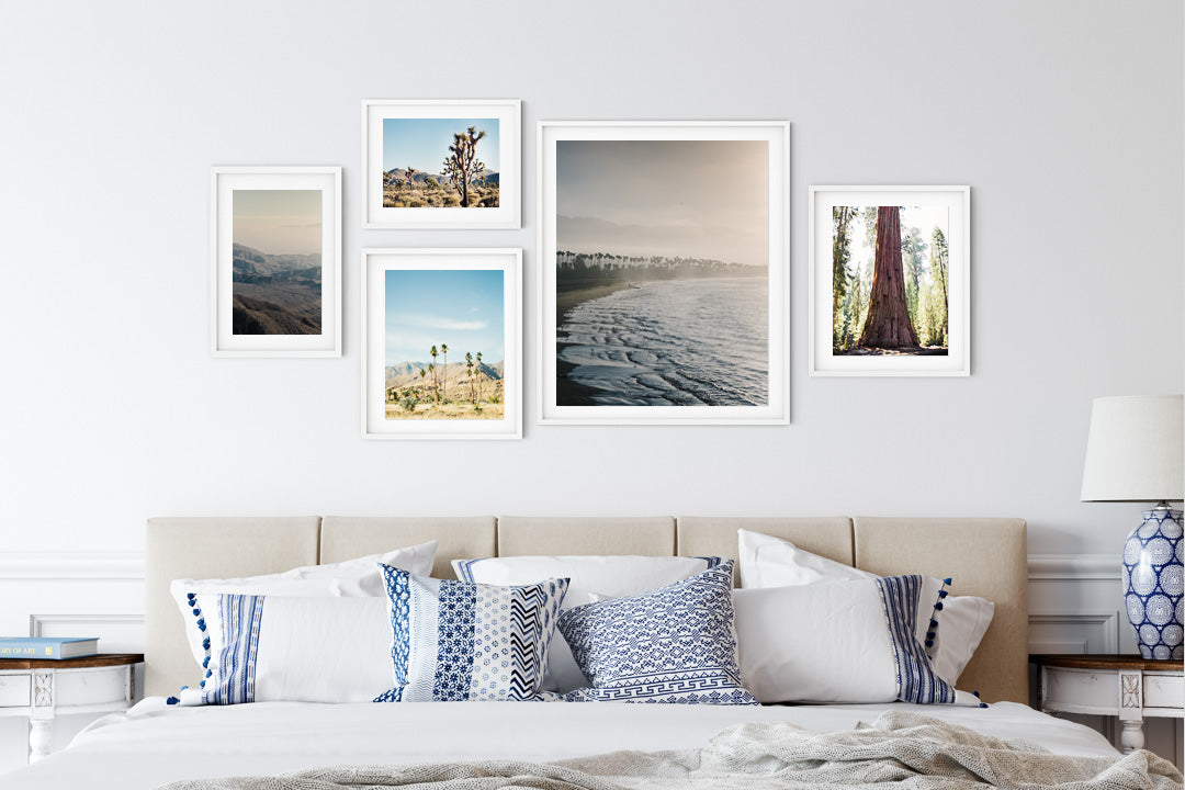 Photographs of California locations including Santa Barbara, Palm Springs, Joshua Tree National Park and Sequoia National Park displayed as a Gallery Wall in a Bedroom as Wall Art