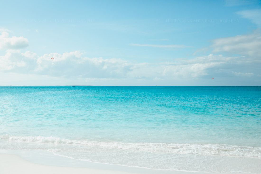 A calm beach view of the waters in Turks & Caicos.
