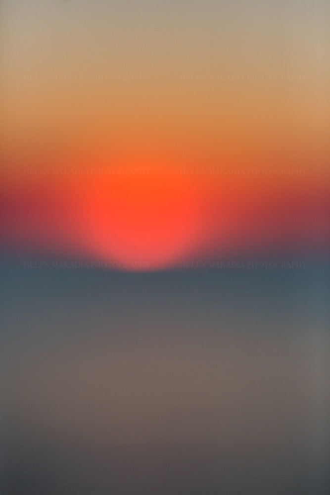 Sun Setting in the Horizon Abstract Photograph