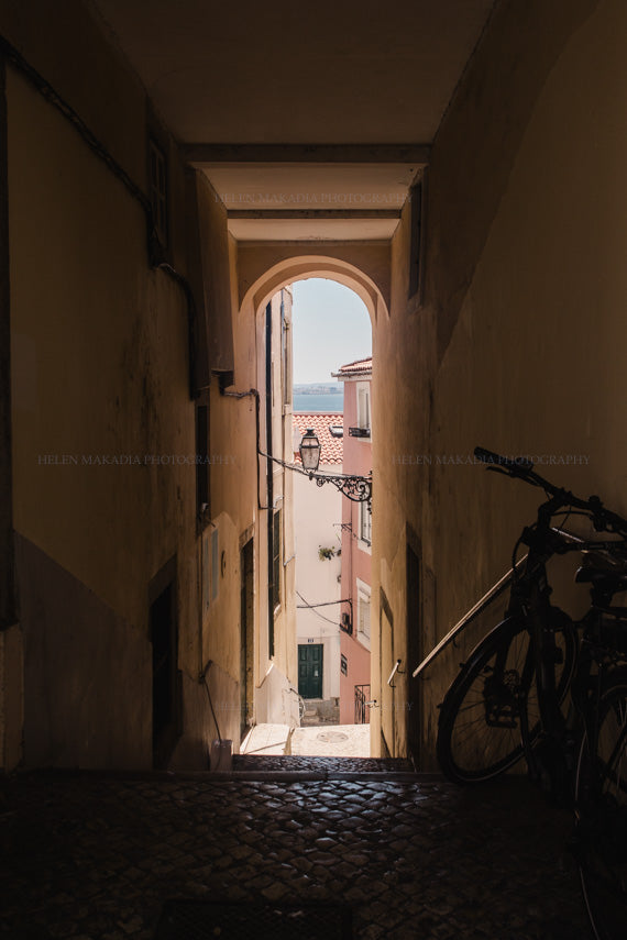 Photograph of a narrow street and staircase in Lisbon Portugal