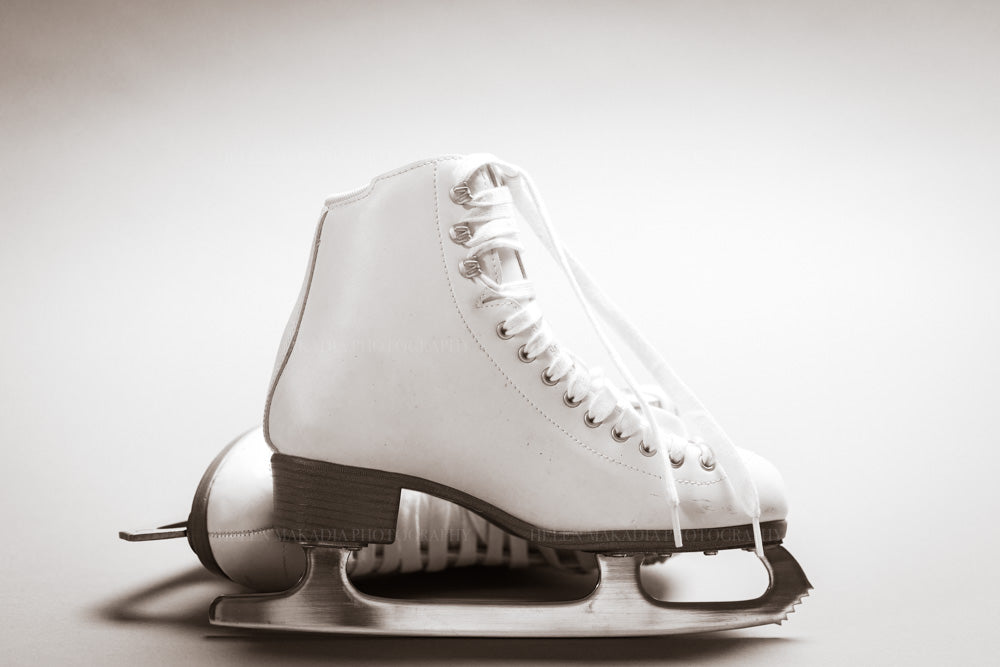 A photograph of white figure skates