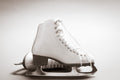 A photograph of white figure skates