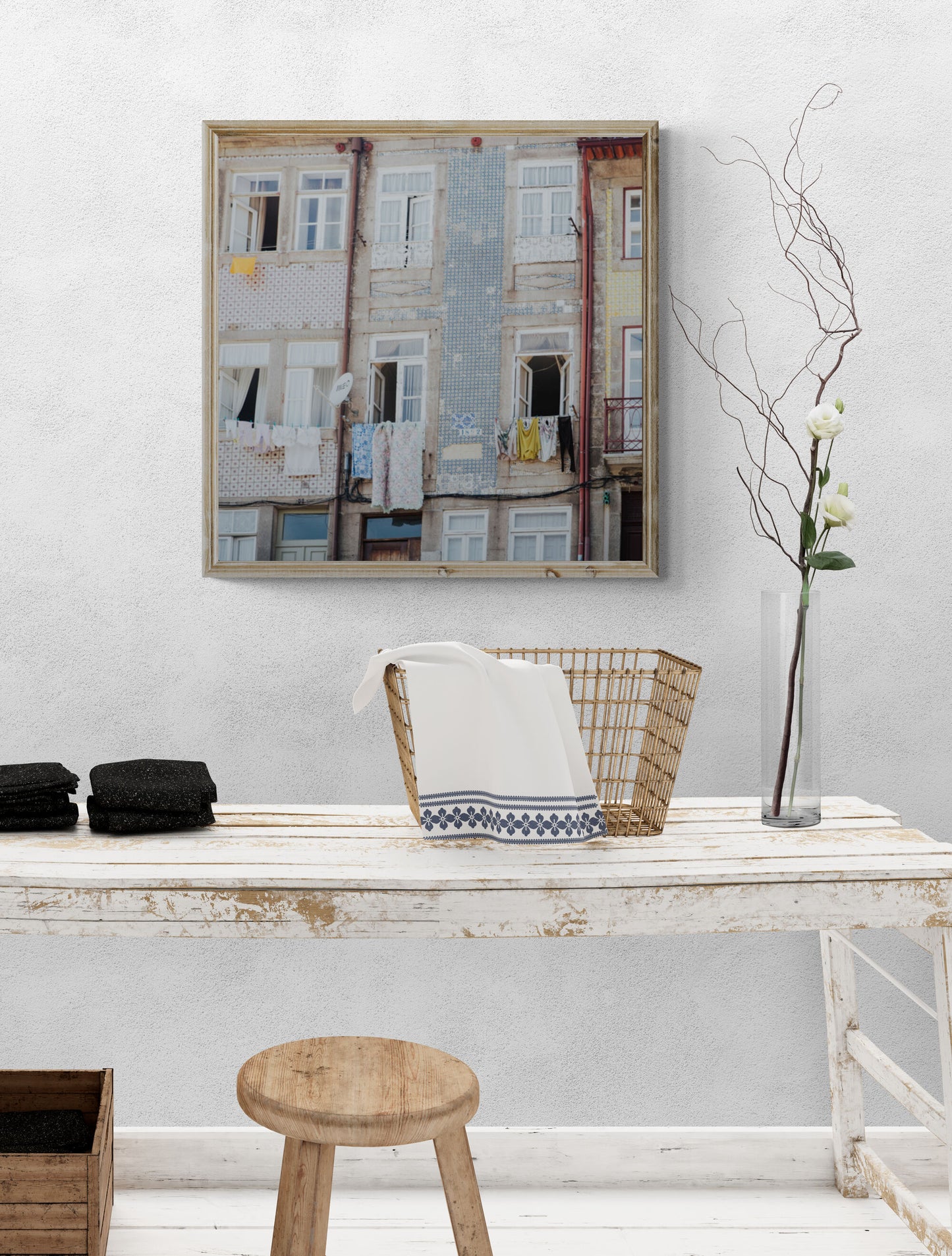 Laundry on a clothesline in Porto Portugal with windows and balconies in laundry room