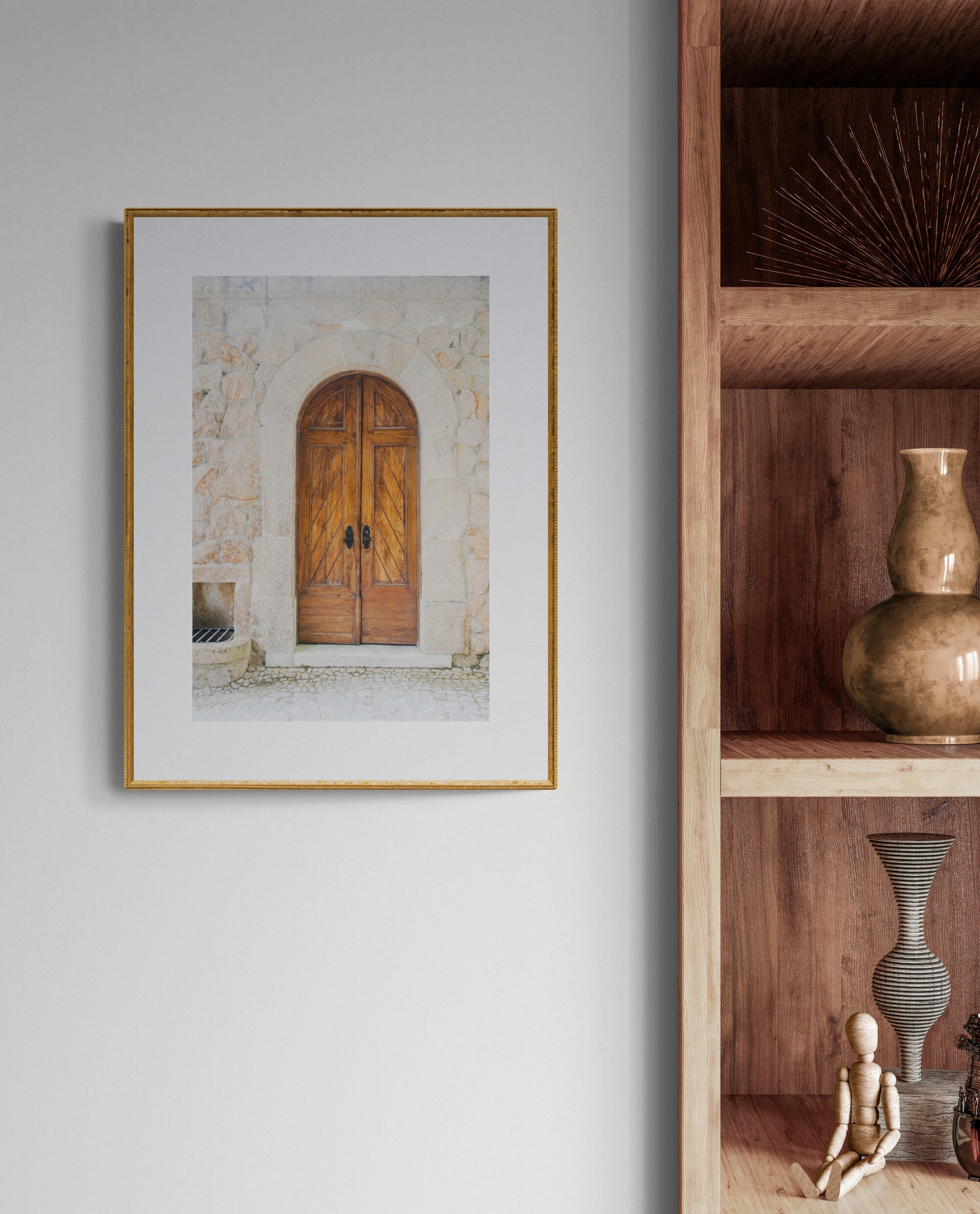 Arched wooden door photograph of sintra portugal as wall art in a living room
