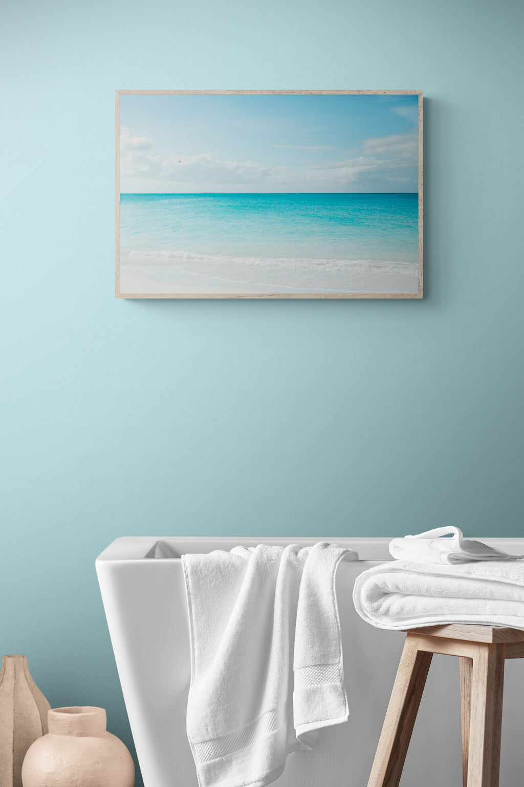 A photograph of the beaches of turks and caicos as bathroom wall art.