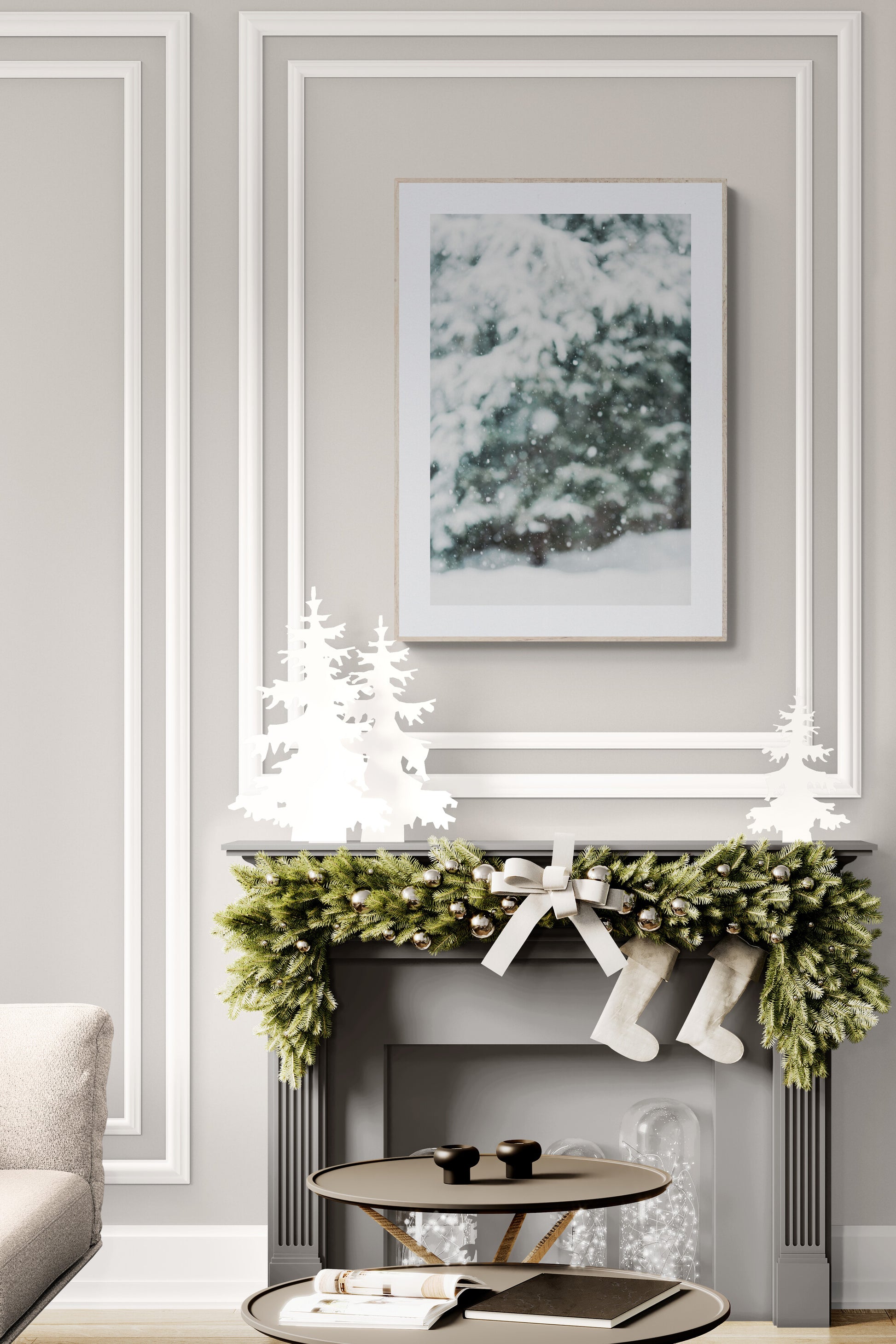 An abstract snowy evergreen photograph as wall art in a living room.