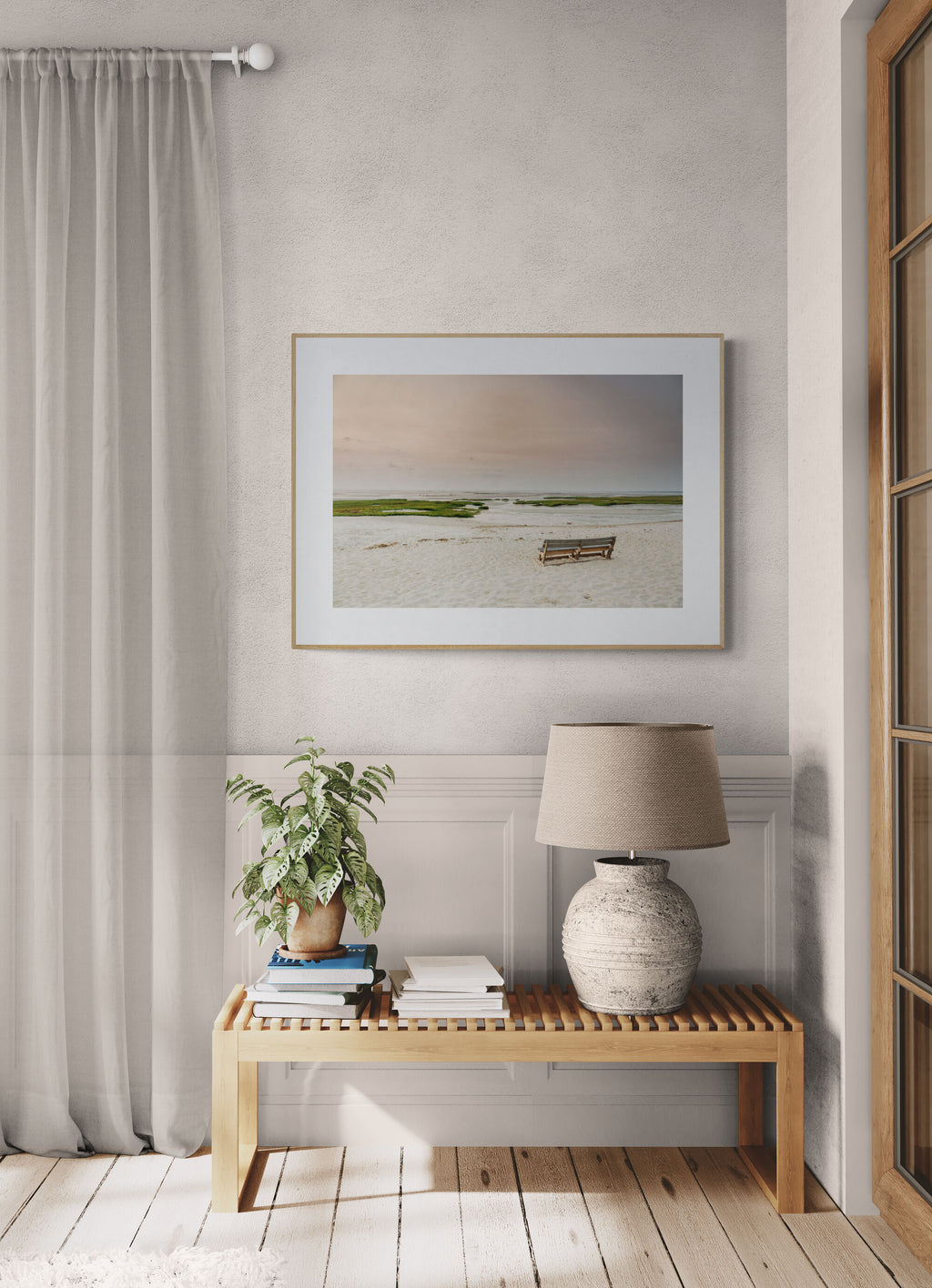 Beach photograph of bench at sunset and low tide in living room