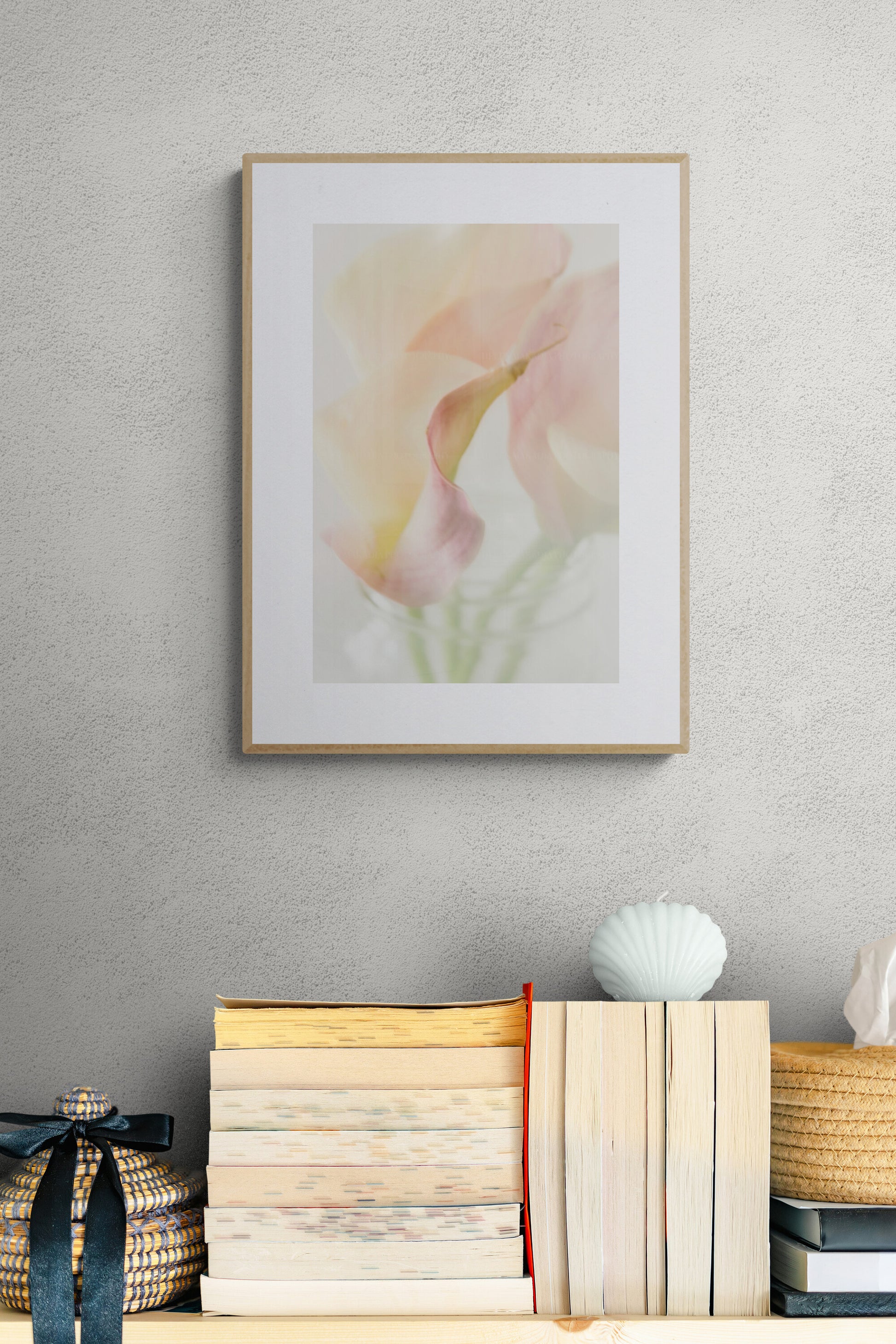 Photograph print of calla lilies as wall art in a home study