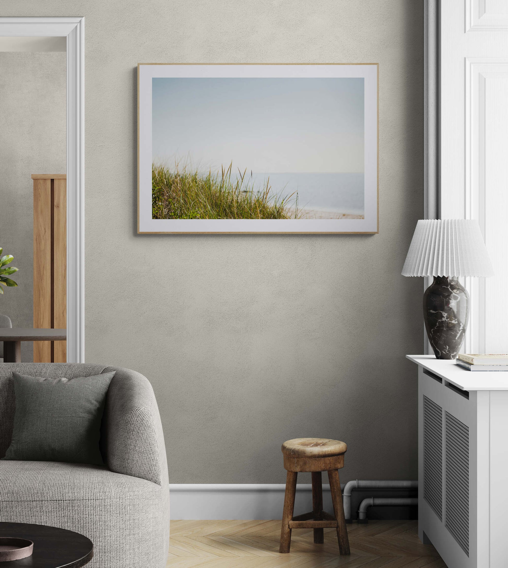 Calm beach photograph in living room as wall art