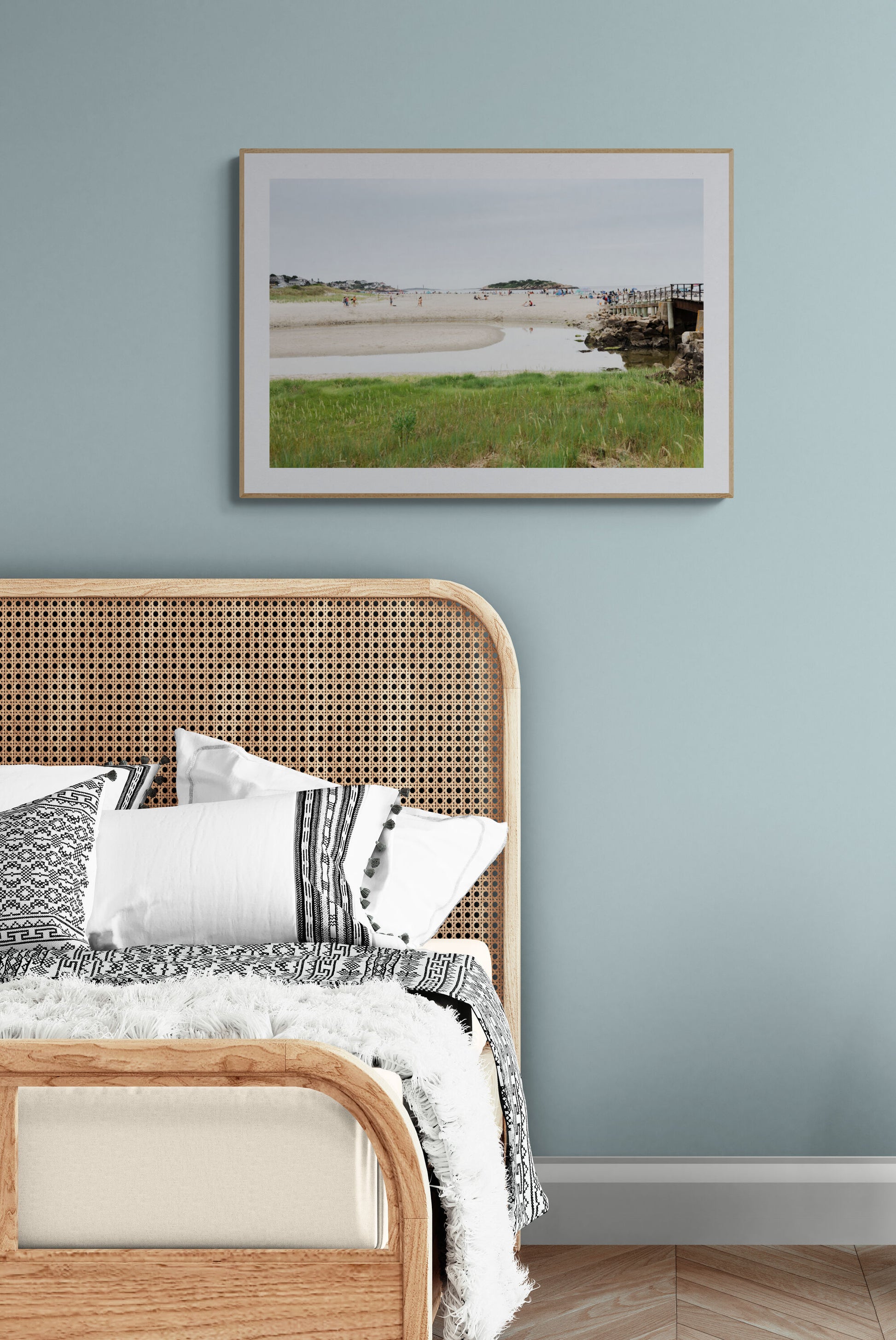 Framed Photograph of Good Harbor Beach and the pier in Gloucester MA in a bedroom as wall art decor. 