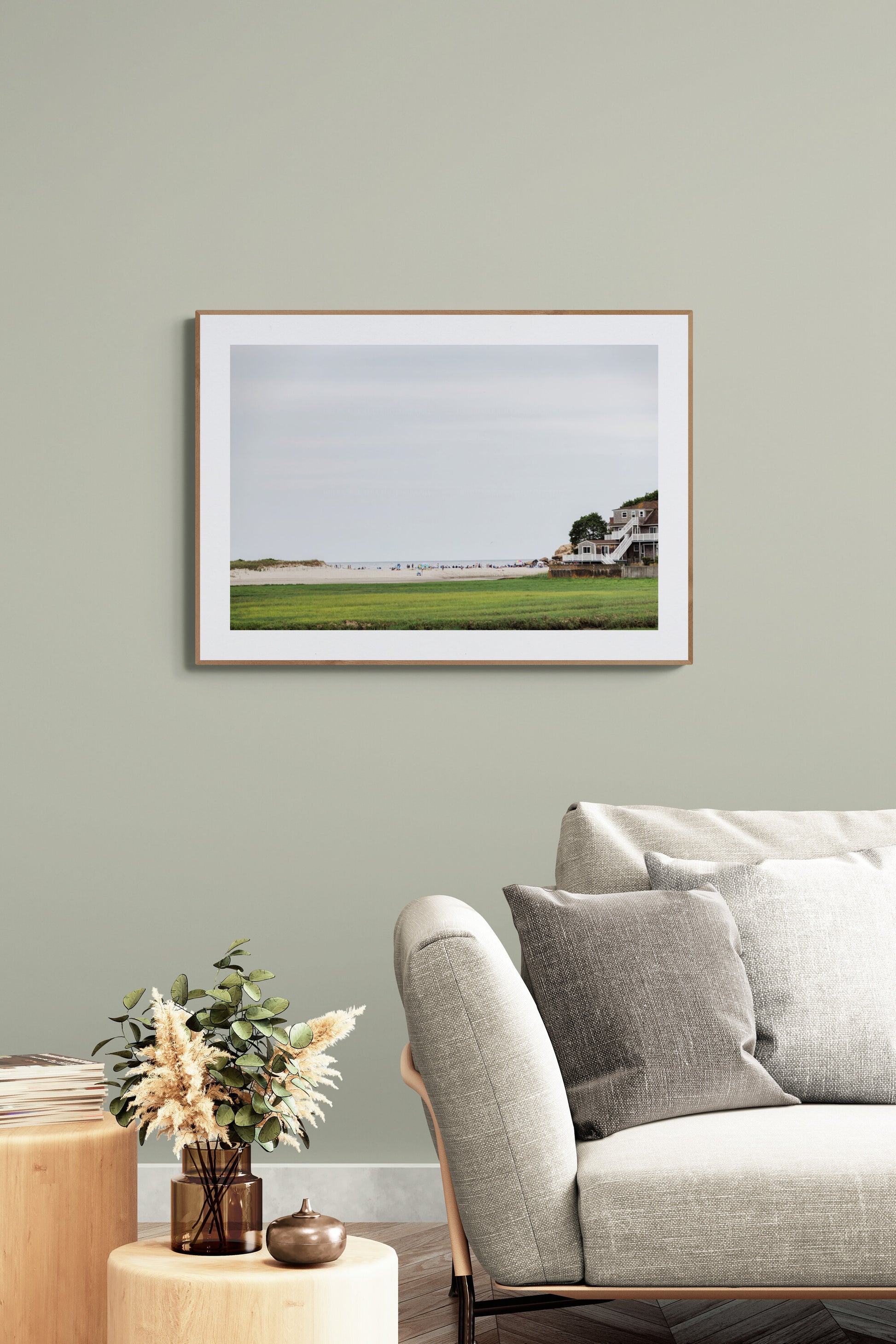Framed Photograph of Good Harbor Beach and the pier in Gloucester MA in a living room as wall art decor. 