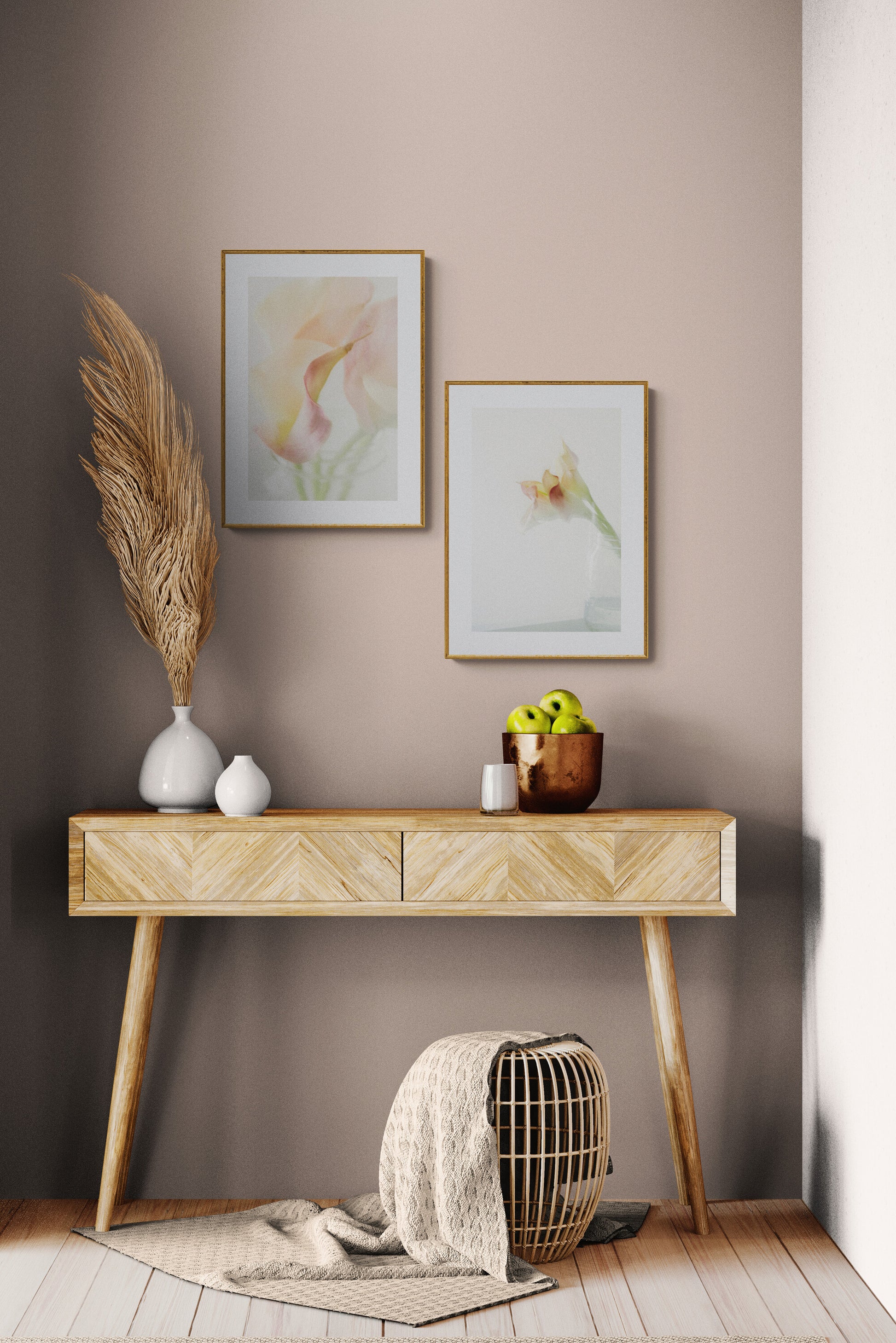 A set of two photographs of calla lilies as wall art in a hallway.