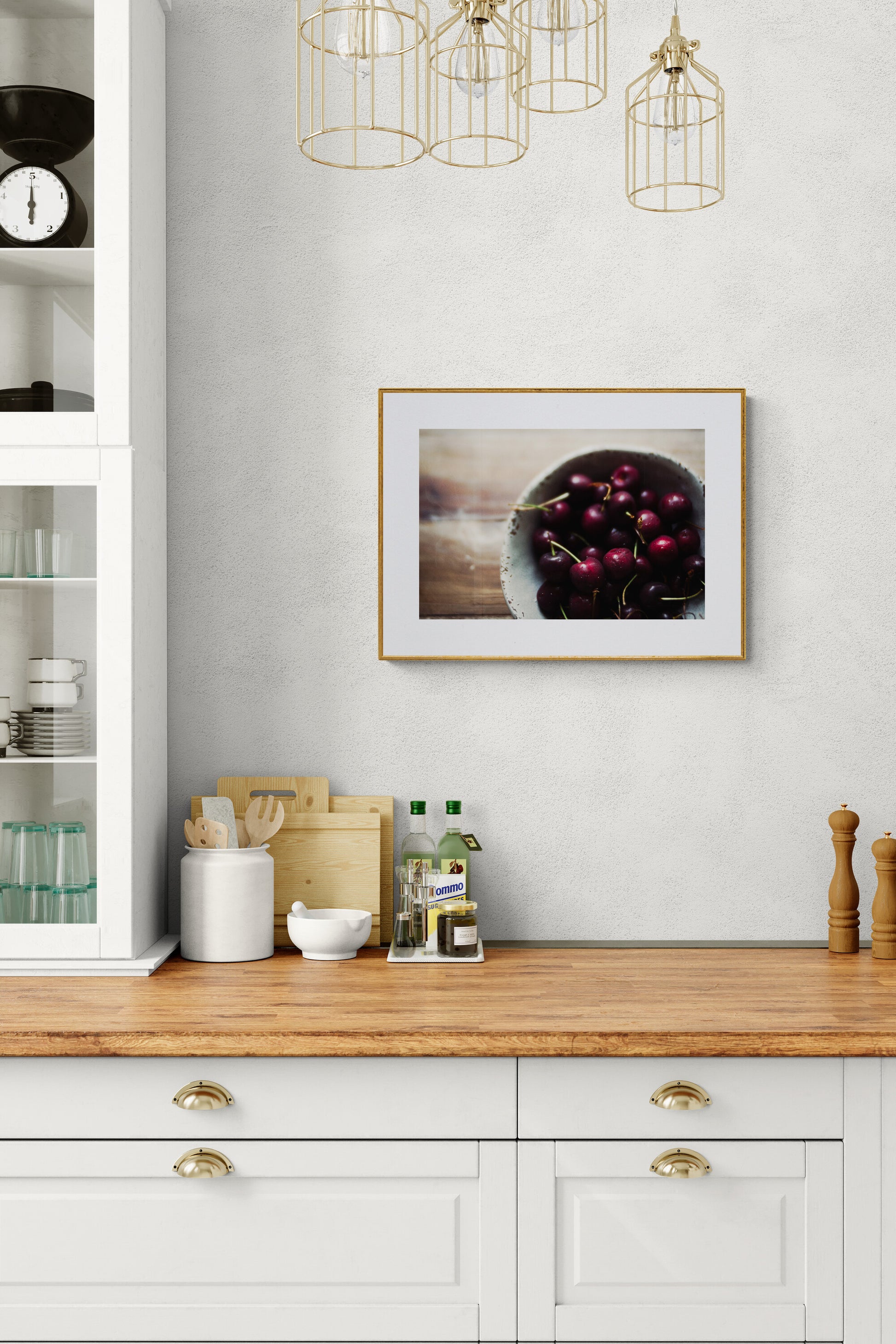 photograph of red cherries as kitchen wall art in a kitchen