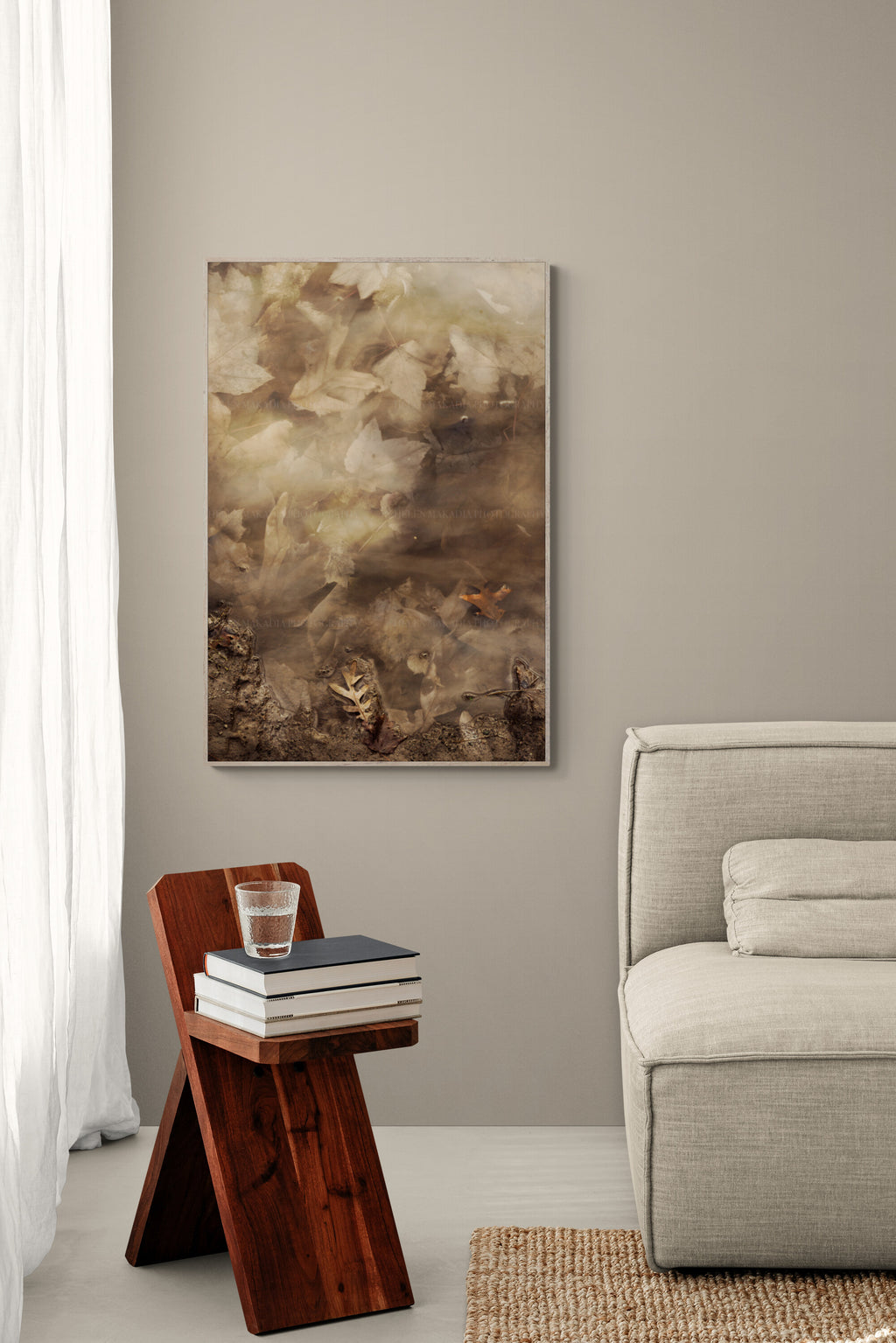 An abstract photograph of maple leaves in a modern living room as wall art