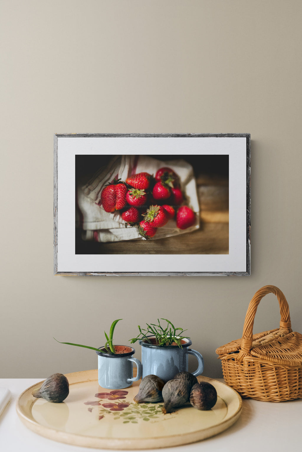 photograph of strawberries as wall art in a kitchen