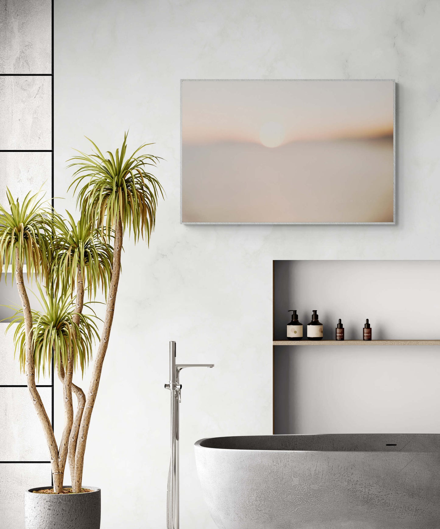 A photograph of the sunset dipping into the horizon as a bathroom wall art