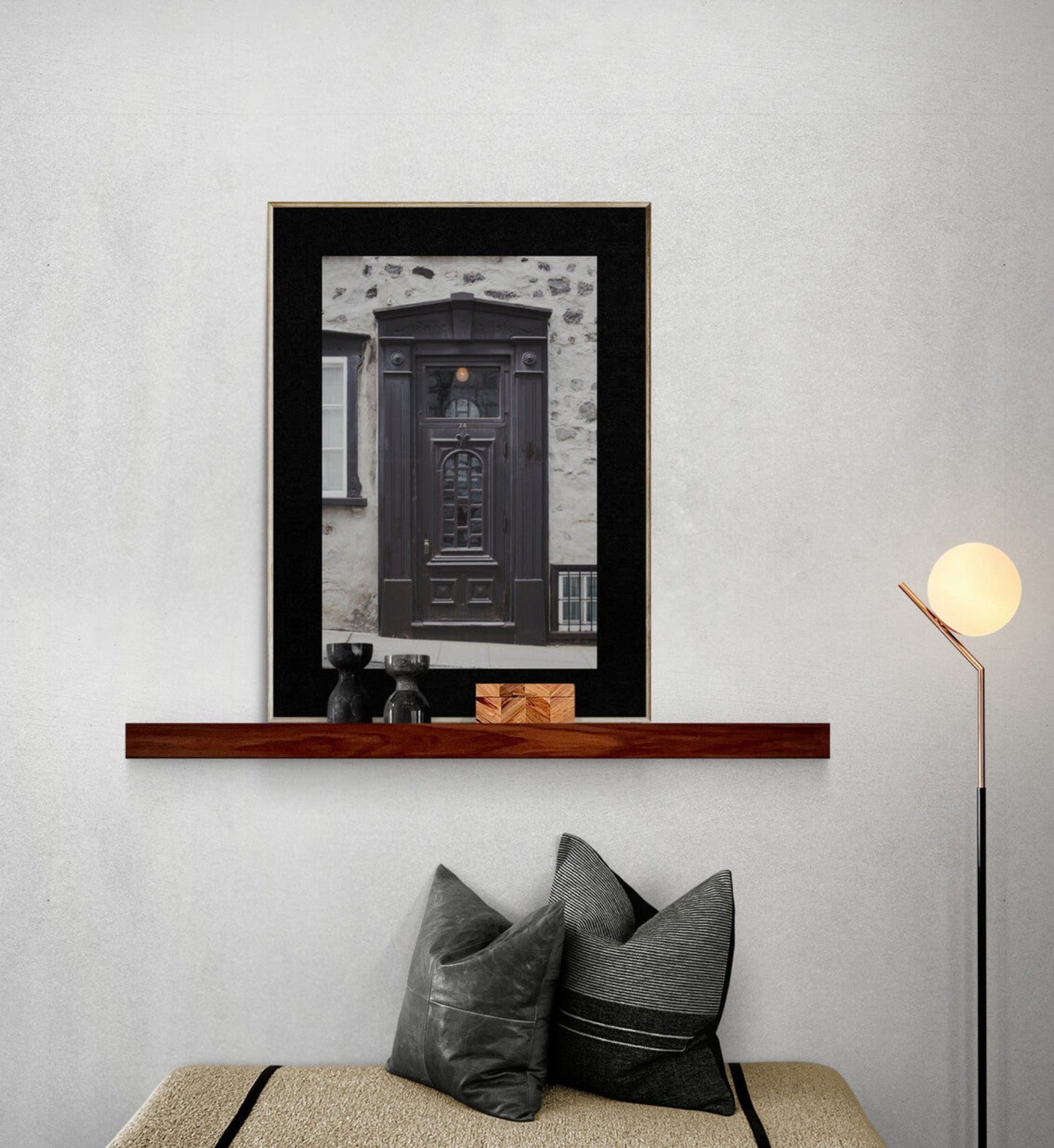 black wood door photograph of quebec city in a living room