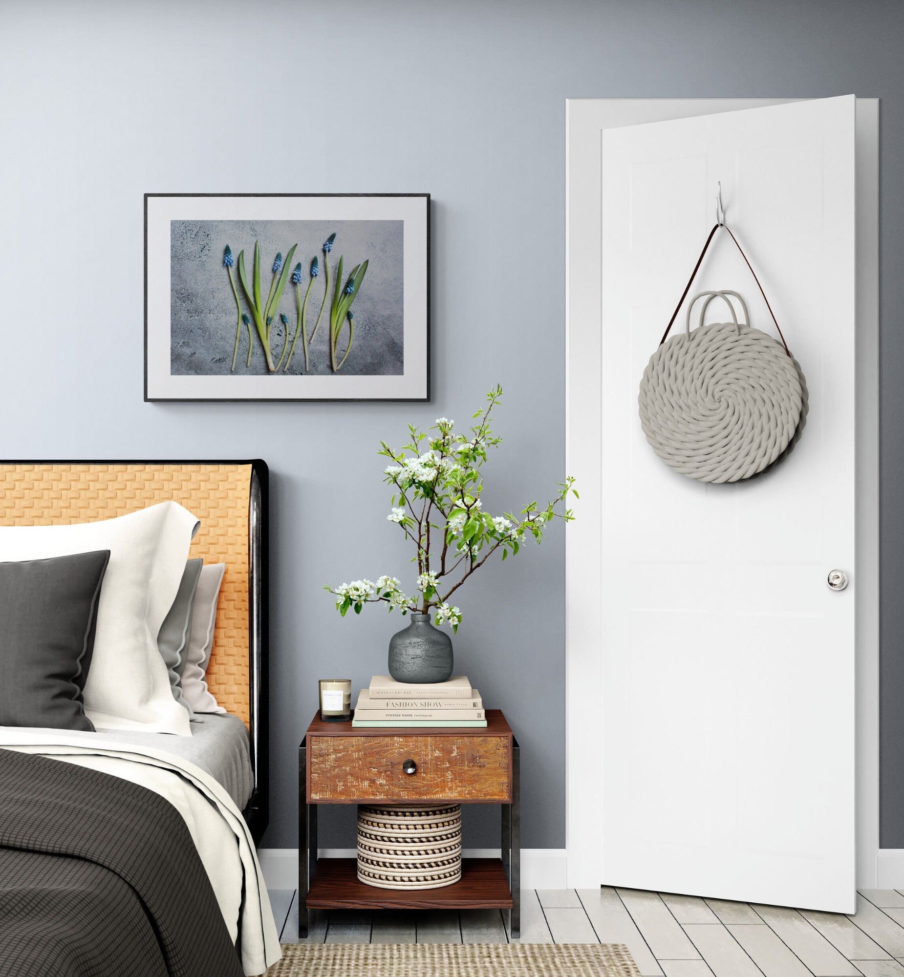 Blue flowers photograph as wall art in a comfy bedroom