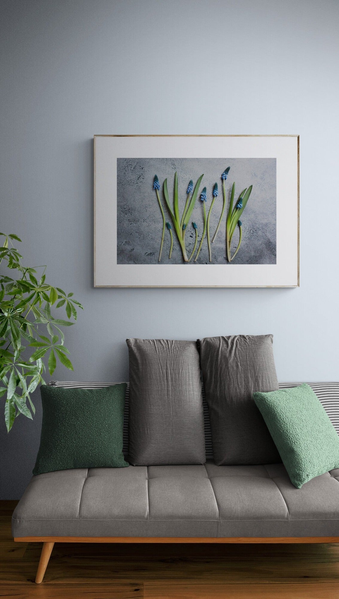 blue flowers photograph as wall art in a living room