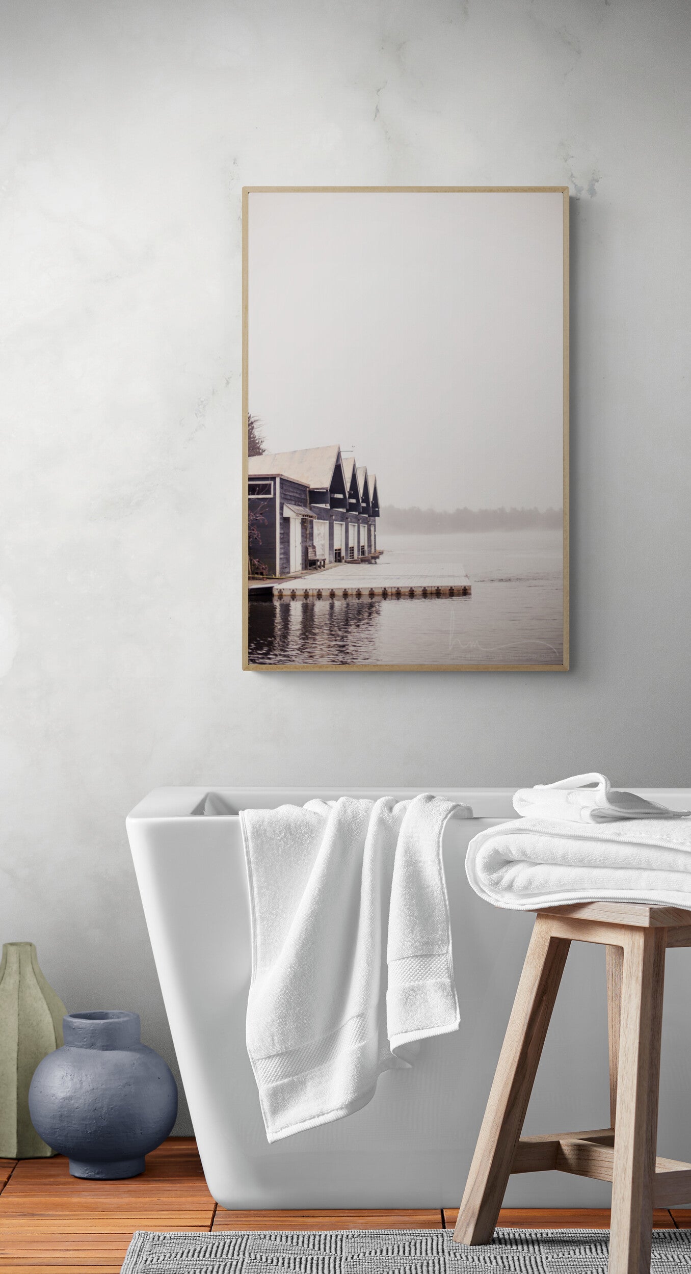 Boathouse on a lake photograph in a bathroom as wall art