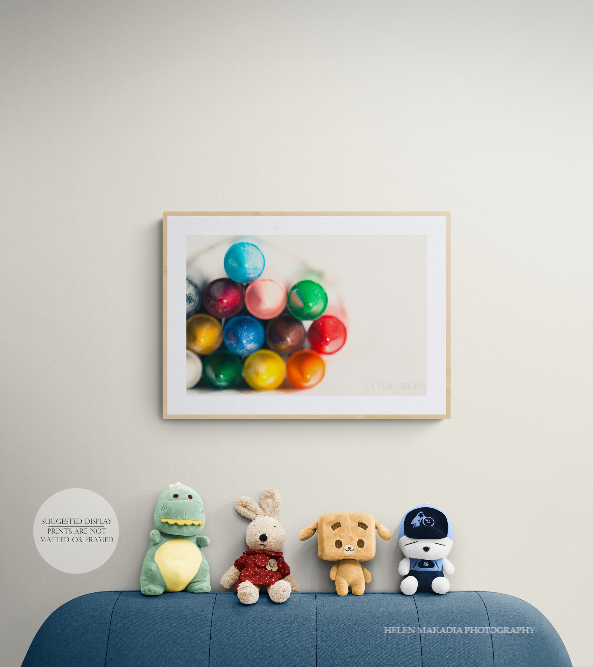 Photograph of vibrant, colorful crayon tips as wall art in a playroom