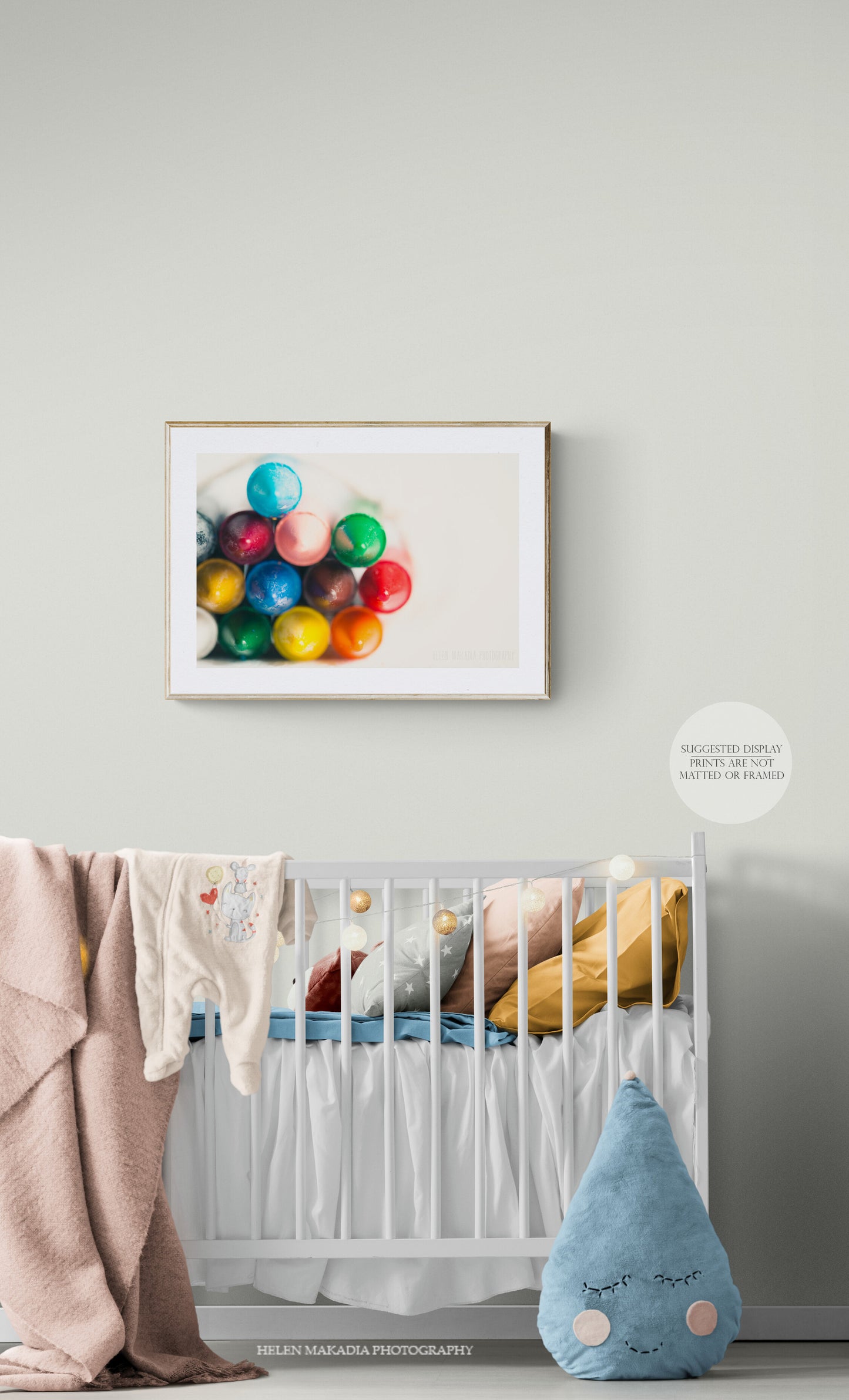 Photograph of vibrant, colorful crayon tips as wall art in a nursery