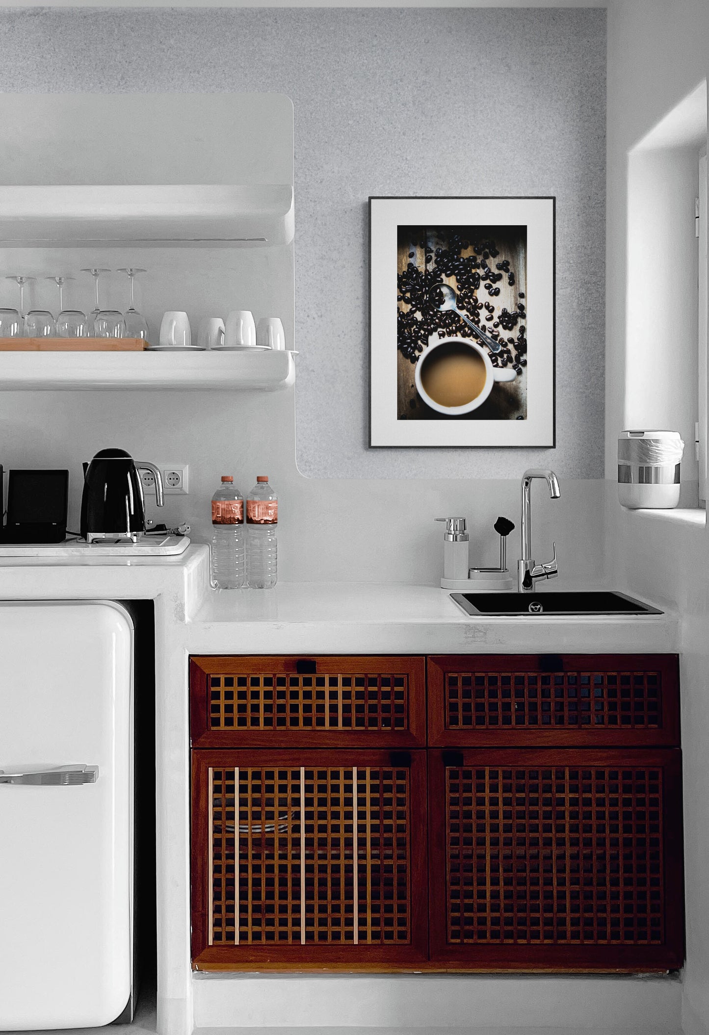 Cup of coffee and coffee beans photograph print in a small kitchen