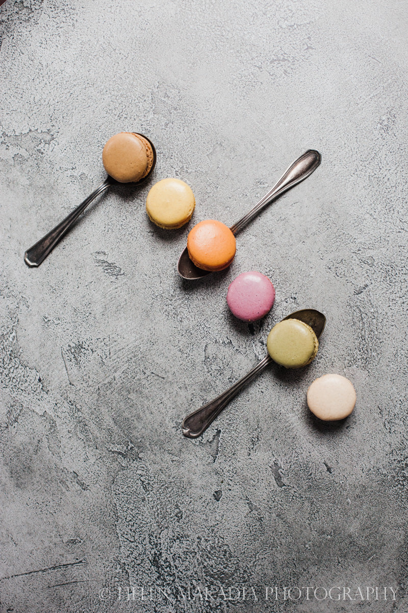 Photograph of Pastel Macarons on Gray