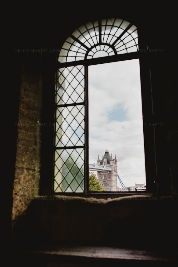 Photograph of Tower Bridge in London as seen from the inside of the Tower of London