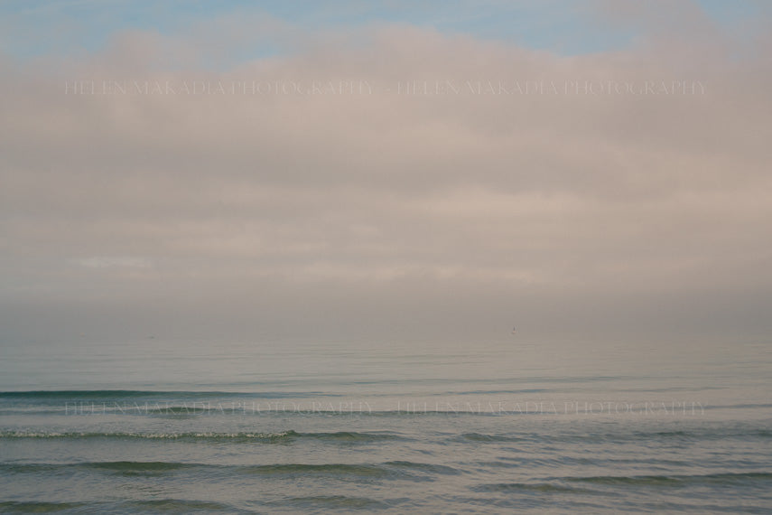 Photograph of Calm Atlantic Ocean Blue Waters of Cod with a Pink sky as Wall Art