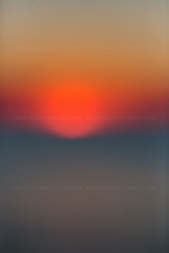 Sun Setting in the Horizon Abstract Photograph