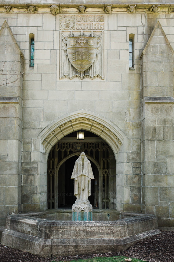 Photograph of Tower Court complex stone facade and statue at Wellesley College 