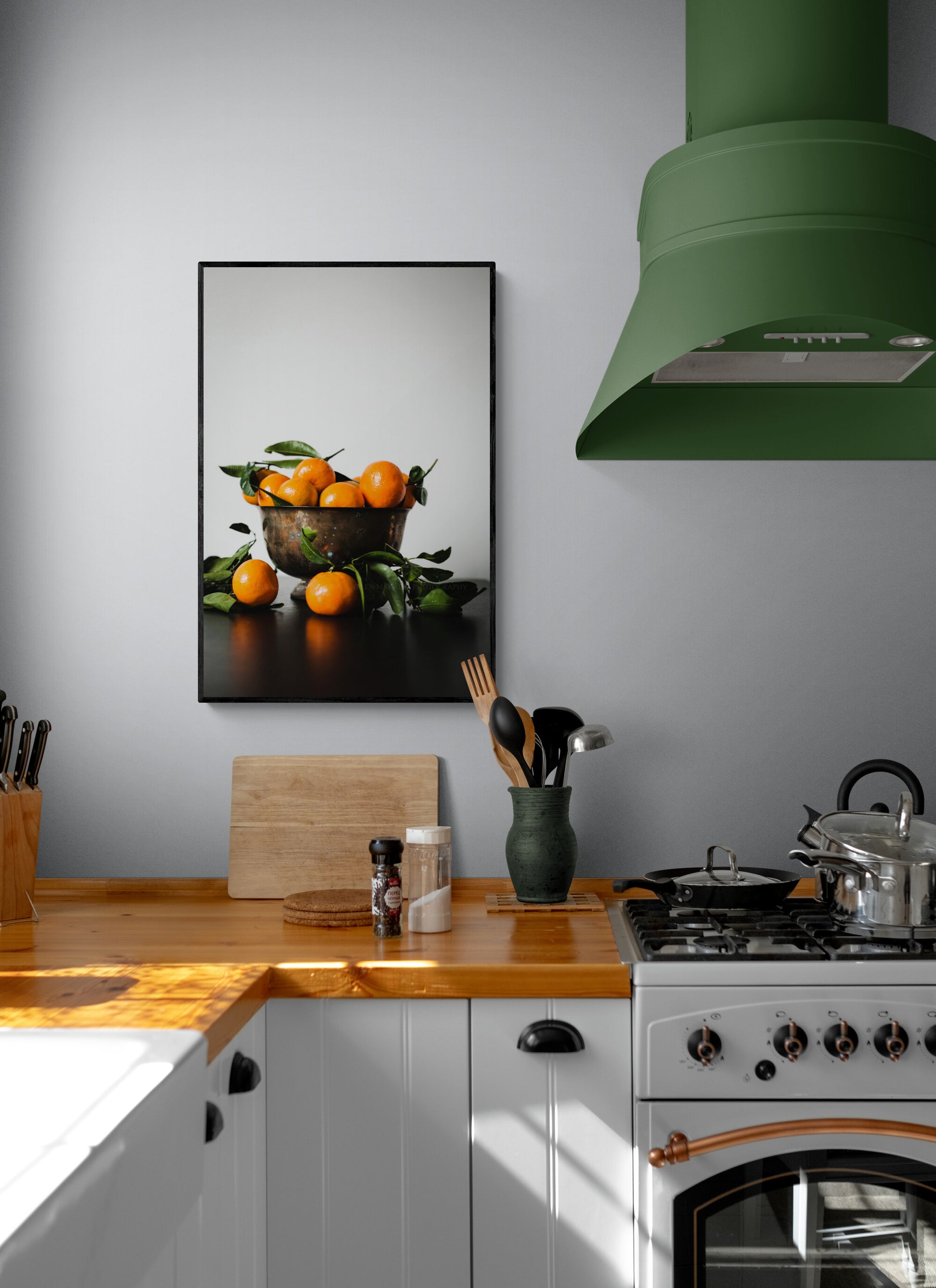 Orange Citrus in a Bowl Photograph as Wall Art in a kitchen