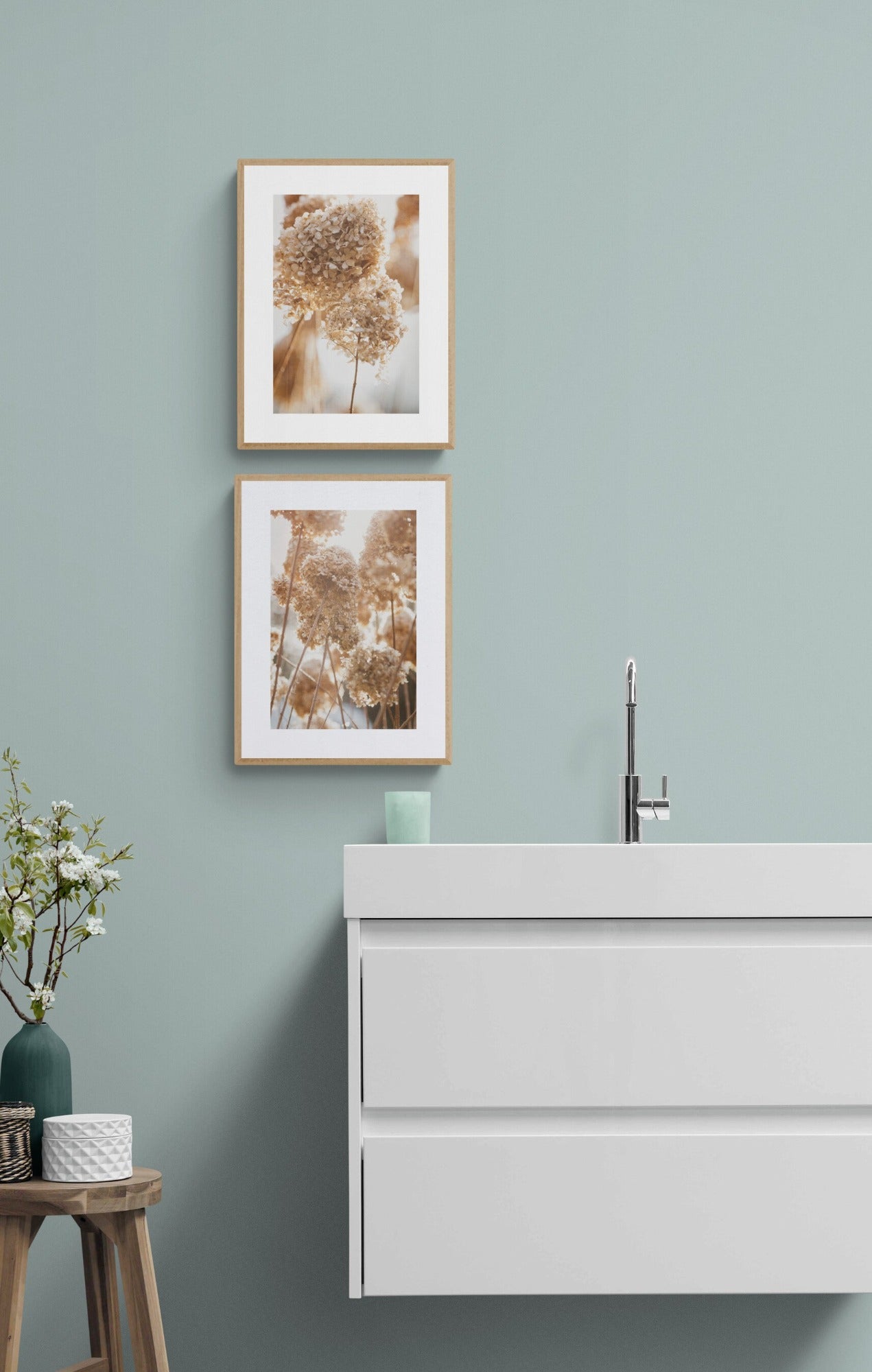 Set of two wall art photographs of winter hydrangeas in a bathroom