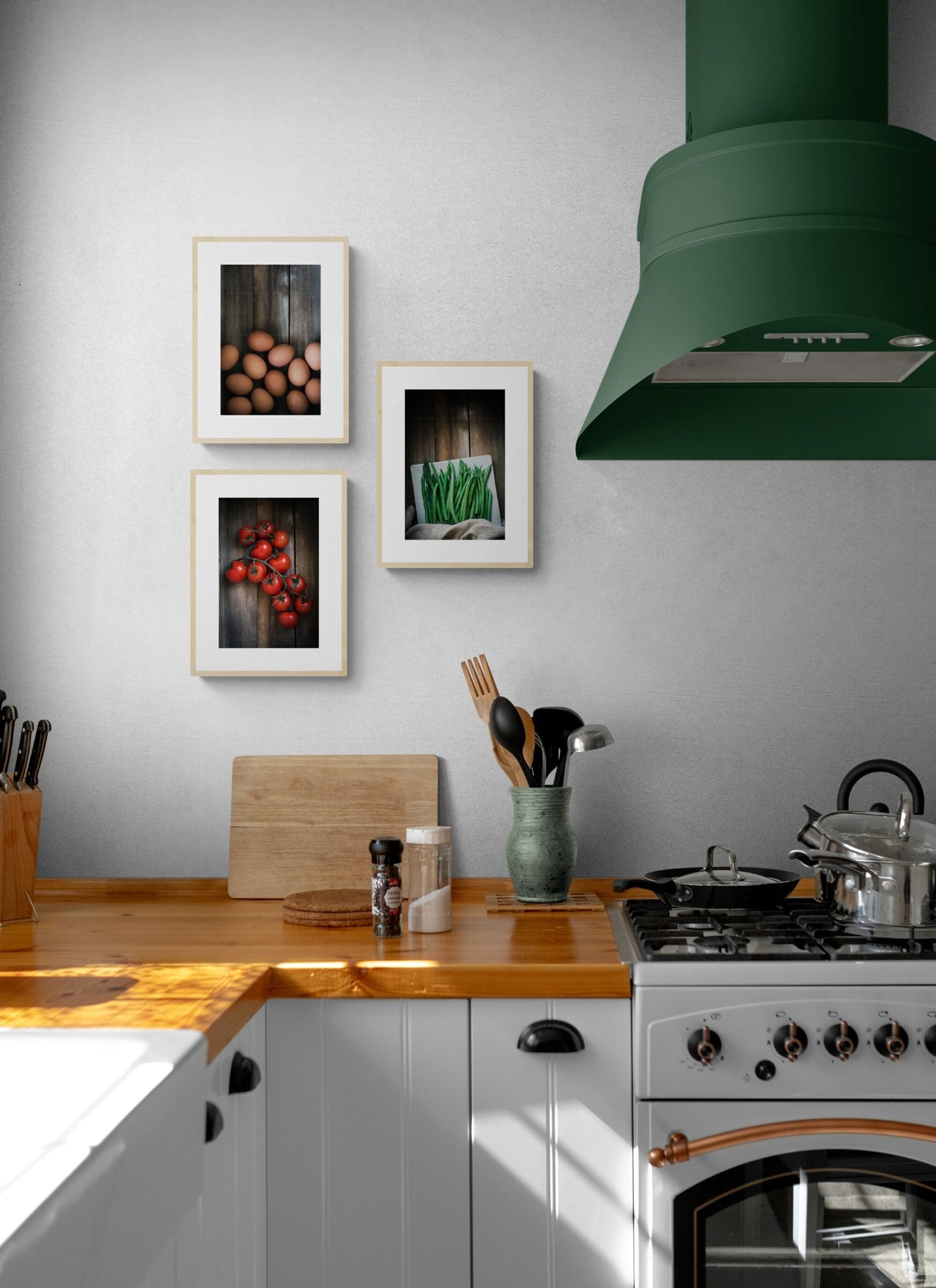 Three food photographs as wall prints in a rustic kitchen