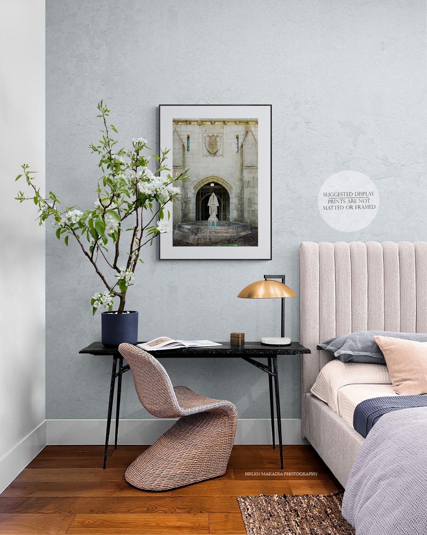 Photograph of Tower Court complex stone facade and statue at Wellesley College framed as wall art in a bedroom