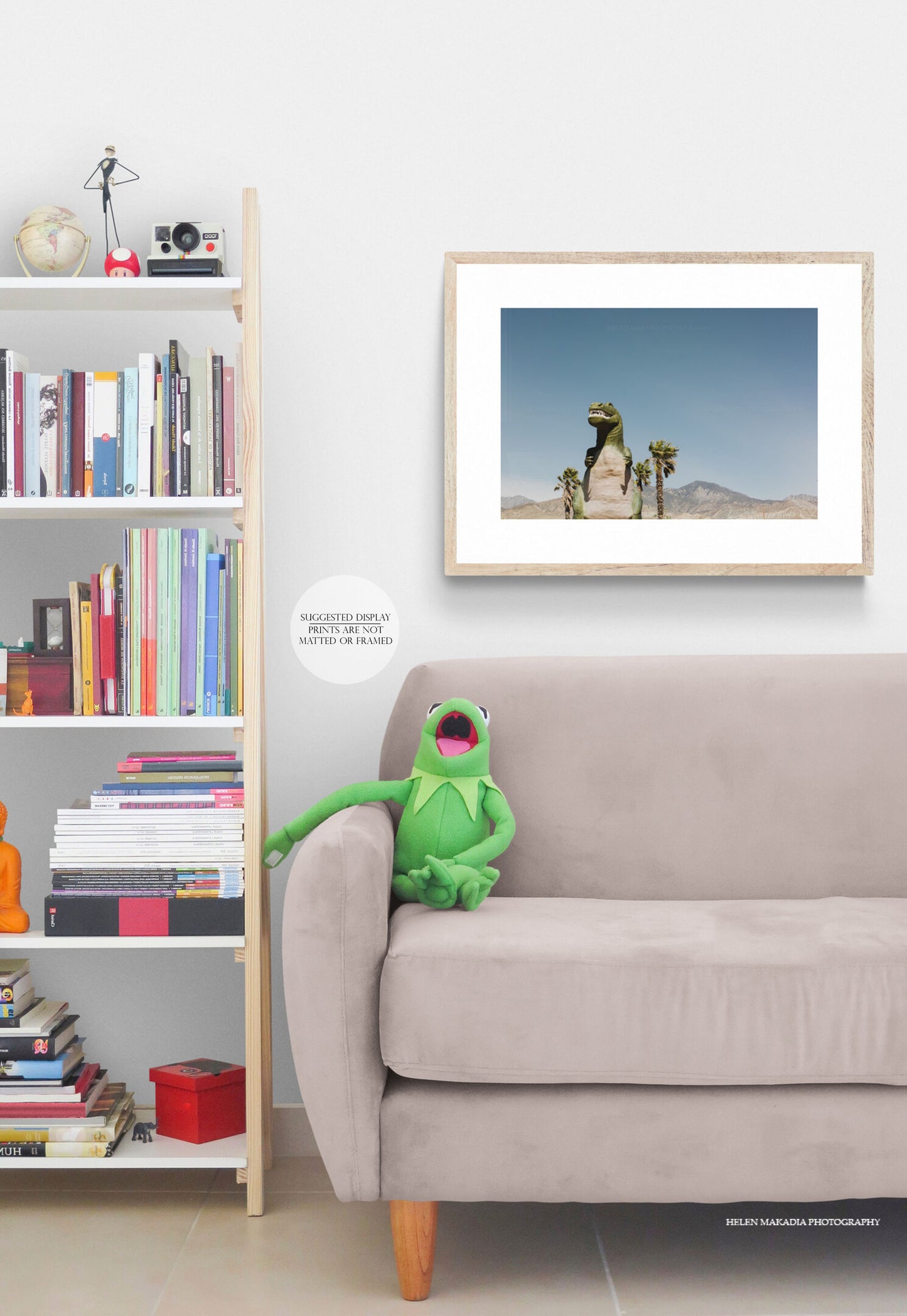 Framed Photograph of T-Rex above a sofa