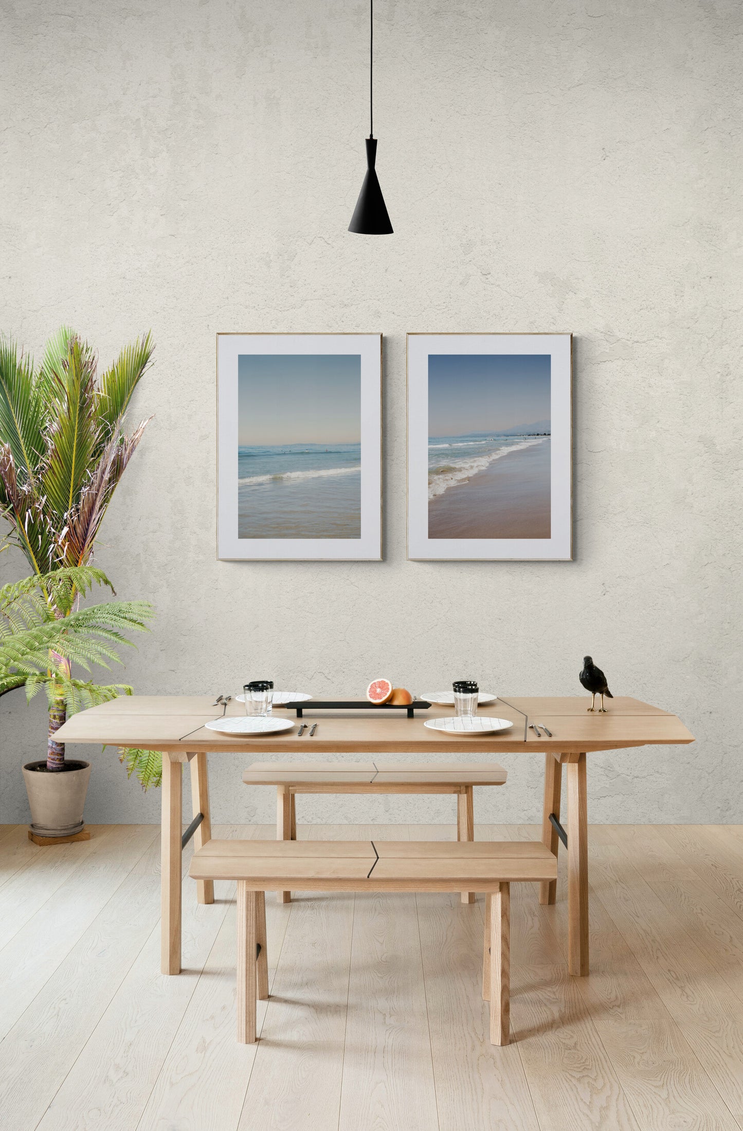 Two Photographs of Carpinteria State Beach as wall art in a kitchen