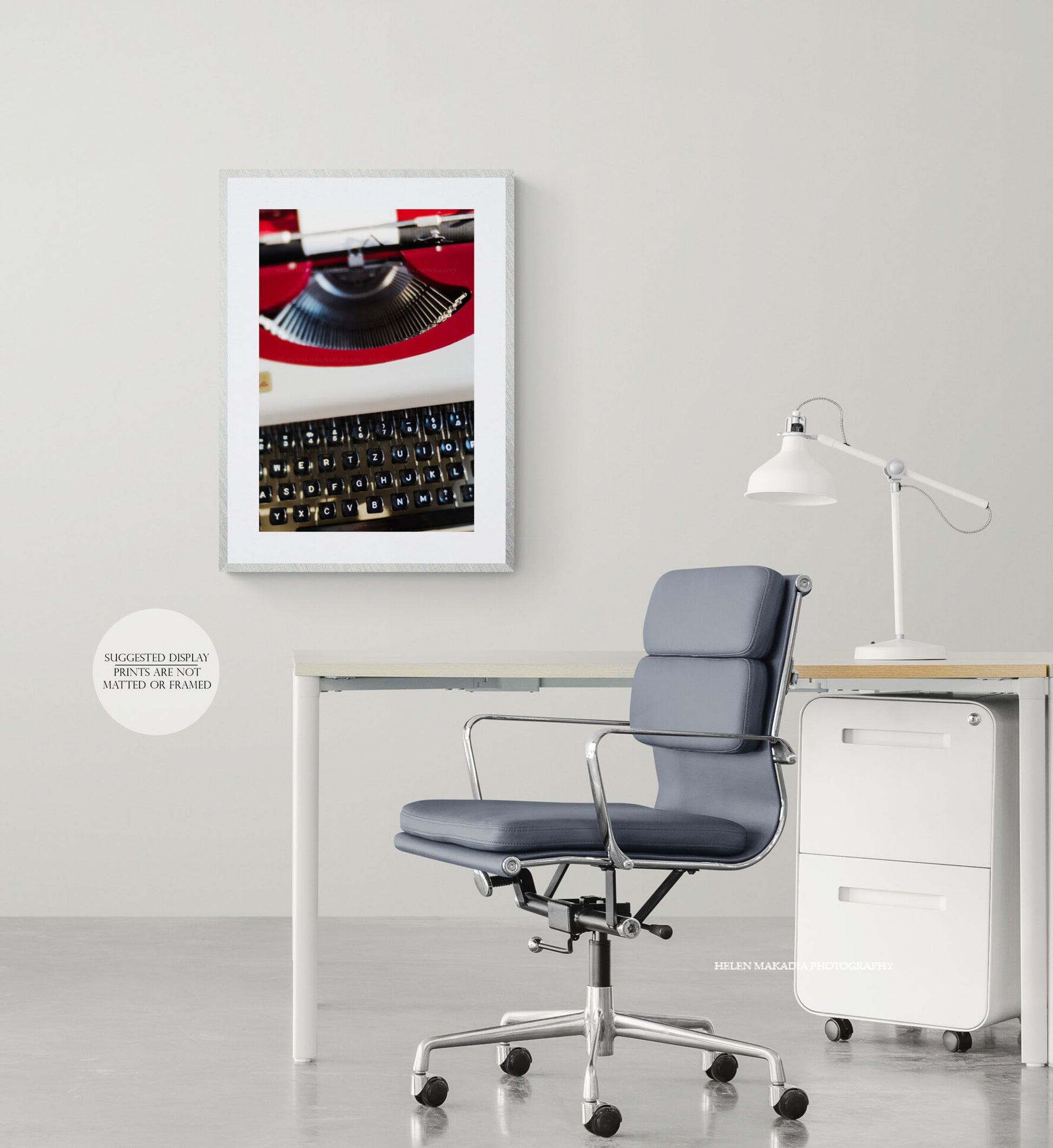Framed photograph of a vintage mid-century typewriter, in a modern office