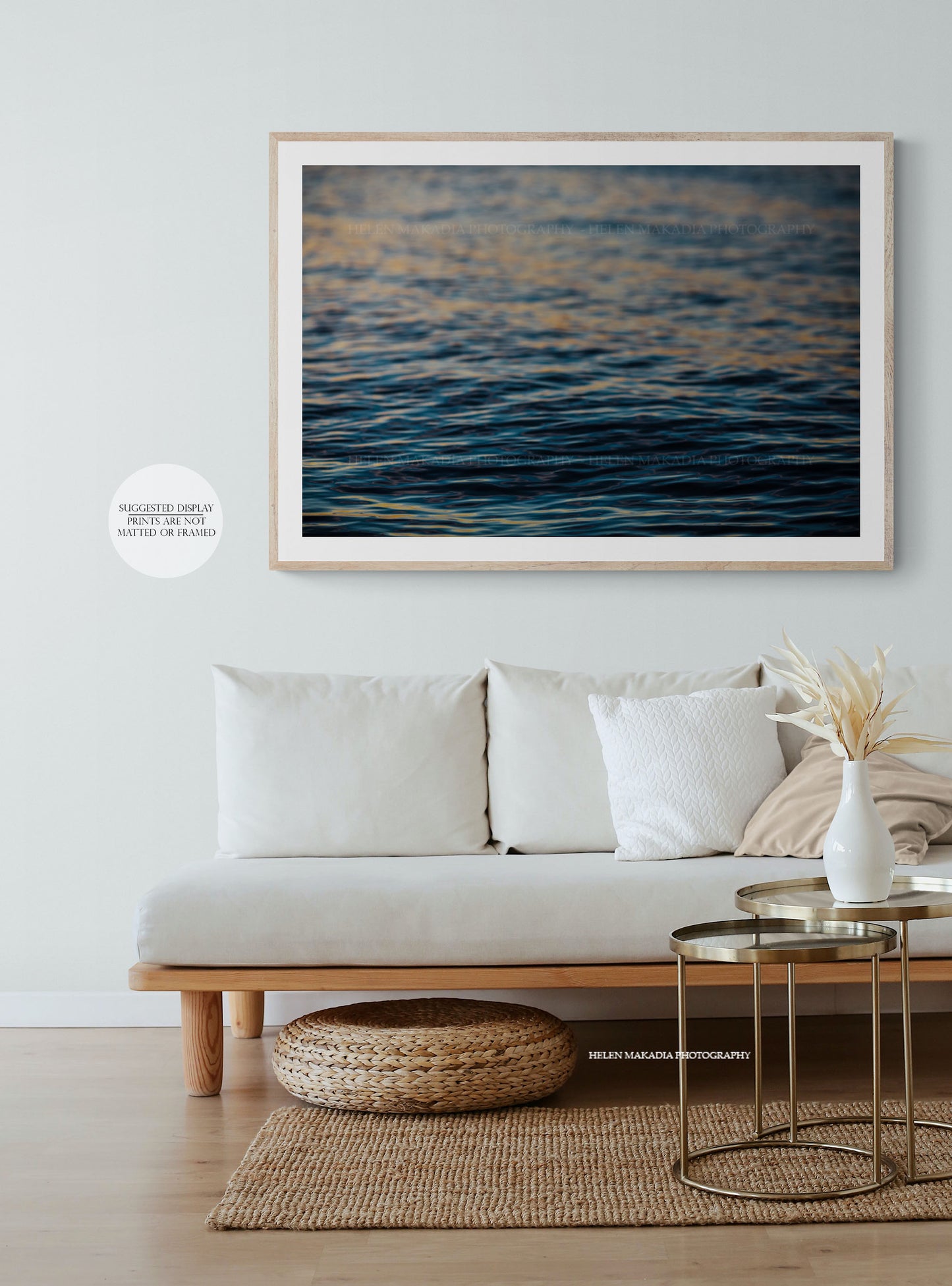 Nautical Print hanging over the couch in a Living Room
