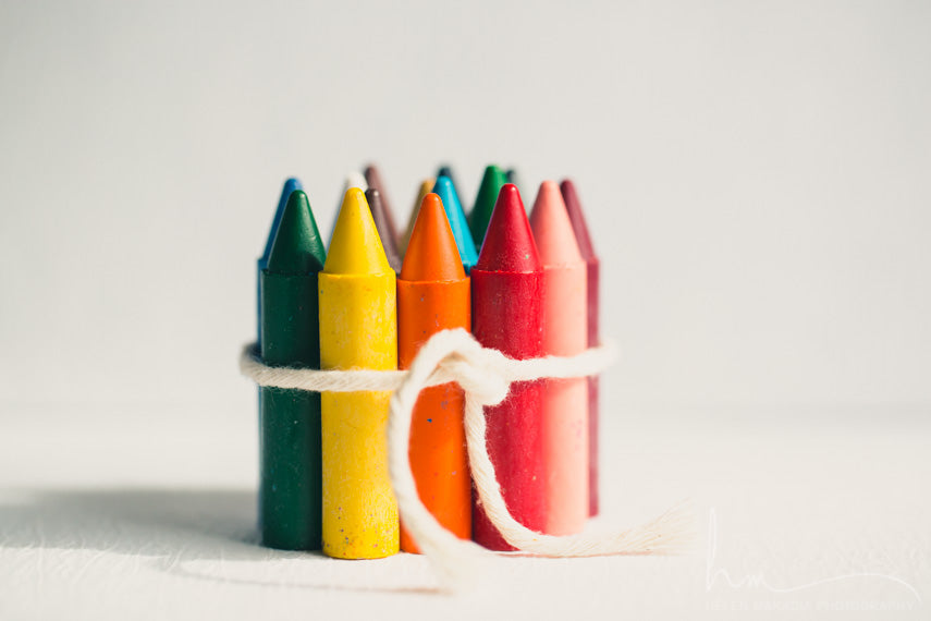 A photograph of a group of rainbow crayons, as wall art