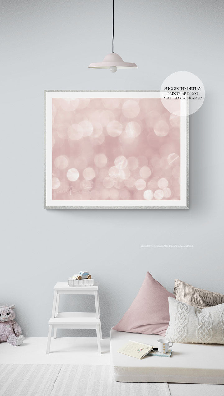 A print of abstract pink bubbles in a kid's room 